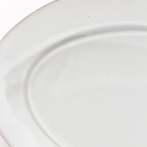 Deluxe Black Soil Oval Plate in White Close up